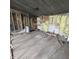 Incomplete kitchen restoration with exposed insulation and open cabinets at 1704 E Kirk St, Muncie, IN 47303