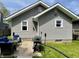 Backyard with a patio, grill, and outdoor seating, perfect for entertaining at 1749 E 52Nd St, Indianapolis, IN 46205