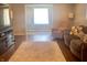 Inviting living room with hardwood floors, a cozy sofa, a comfortable armchair, and lots of natural light at 1749 E 52Nd St, Indianapolis, IN 46205