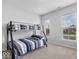 Bright bedroom featuring a bunk bed and natural light from two windows at 19283 Donelson Ln, Westfield, IN 46062