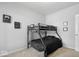 This bedroom features bunk bed with black bedding and gaming decor at 19283 Donelson Ln, Westfield, IN 46062