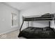 This is a cozy bedroom with bunk beds and natural light at 19283 Donelson Ln, Westfield, IN 46062