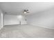 Spacious bonus room with plush carpet and architectural details at 19283 Donelson Ln, Westfield, IN 46062