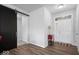 Welcoming entrance features wood floors, a patterned rug, and a sliding barn door at 19283 Donelson Ln, Westfield, IN 46062