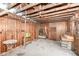 Large basement with wooden walls, concrete floors, and exposed wooden beams at 2001 S I St, Elwood, IN 46036