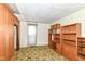 Basement with shelves and floral print carpet at 2001 S I St, Elwood, IN 46036