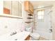 Standard bathroom features a toilet, shower and bathtub combo, and a tiled backsplash at 2001 S I St, Elwood, IN 46036