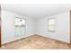 Bright bedroom featuring two windows and neutral carpet at 2001 S I St, Elwood, IN 46036