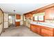 Kitchen featuring wood cabinets and view of bathroom at 2001 S I St, Elwood, IN 46036
