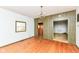 Living room with hardwood floors, neutral walls, and natural light, showcasing a classic interior design at 2001 S I St, Elwood, IN 46036