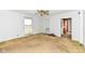 Living room with neutral walls, classic trim, and outdated carpet, ready for renovation and personalization at 2001 S I St, Elwood, IN 46036