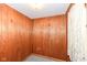 Small room with wood paneling, carpet, and natural light at 2001 S I St, Elwood, IN 46036