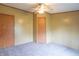 Comfortable bedroom with carpet and two doors, designed for convenience and personal space at 2088 Brandywine Ln, Martinsville, IN 46151