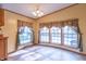 Sun-drenched dining area featuring large windows and neutral flooring at 2088 Brandywine Ln, Martinsville, IN 46151