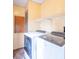 Laundry room featuring a side-by-side washer and dryer set and overhead rack at 2088 Brandywine Ln, Martinsville, IN 46151