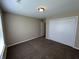 Comfortable bedroom with carpet, ample closet space, and natural light at 2344 Orchard Creek Dr, Columbus, IN 47201
