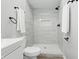 Sleek bathroom featuring a walk-in shower with decorative tile and modern fixtures at 2352 Stuart St, Indianapolis, IN 46218