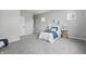 Bright bedroom with plush carpeting, side tables, and minimalist décor at 2352 Stuart St, Indianapolis, IN 46218