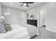 Well-lit bedroom with neutral tones, carpeted floor, and en suite bathroom at 2352 Stuart St, Indianapolis, IN 46218
