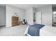 Stylish bedroom with a comfy bed, wood dresser, and plush carpet at 2352 Stuart St, Indianapolis, IN 46218