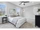 Bright bedroom with soft grey walls, plush carpet, and contemporary décor at 2352 Stuart St, Indianapolis, IN 46218