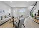Inviting living room showcasing natural light, wood floors, and a cozy seating arrangement at 2352 Stuart St, Indianapolis, IN 46218