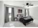 Spacious bedroom with large windows and a ceiling fan at 241 Green Meadow Dr, Indianapolis, IN 46229