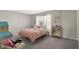 Cozy bedroom with soft carpet and natural light at 241 Green Meadow Dr, Indianapolis, IN 46229