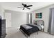 Comfortable bedroom with ceiling fan and two windows at 241 Green Meadow Dr, Indianapolis, IN 46229