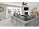 Comfortable living room with plush sectional sofa, fireplace, and plenty of natural light at 241 Green Meadow Dr, Indianapolis, IN 46229
