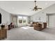 Spacious living room with vaulted ceilings and large windows at 241 Green Meadow Dr, Indianapolis, IN 46229