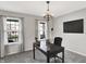 Inviting office space with neutral colors, natural light, and a modern desk at 241 Green Meadow Dr, Indianapolis, IN 46229