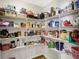 Walk-in pantry with ample shelving space for organized storage at 241 Green Meadow Dr, Indianapolis, IN 46229