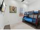 Cozy bedroom with a bunk bed and nice natural light at 2428 N Gale St, Indianapolis, IN 46218
