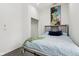 This bedroom showcases a stylish platform bed, a closet, and modern artwork, offering a cozy and functional space at 2428 N Gale St, Indianapolis, IN 46218