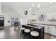Modern kitchen with dark countertops, bar stool seating, and sleek stainless steel appliances at 2428 N Gale St, Indianapolis, IN 46218