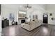 Inviting living room with a stone fireplace, large windows, and elegant flooring at 2428 N Gale St, Indianapolis, IN 46218
