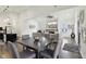 Open-concept view of the dining/living room with vaulted ceilings, modern finishes, and ample space at 2428 N Gale St, Indianapolis, IN 46218