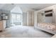 Cozy bedroom featuring a window seat, a four poster bed, and a decorative mirror at 290 Breakwater Dr, Fishers, IN 46037