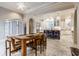 Open kitchen and dining area featuring an island with seating and unique cabinetry at 290 Breakwater Dr, Fishers, IN 46037