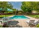 Backyard pool with patio furniture and pergola at 290 Breakwater Dr, Fishers, IN 46037