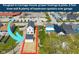 An aerial view of the property highlighting the roughed in carriage house space and its potential at 315 E Minnesota St, Indianapolis, IN 46225