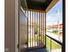 View from modern balcony, featuring wood slats and a view of the neighborhood at 315 E Minnesota St, Indianapolis, IN 46225