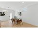 Bright dining room with a modern table set, ample natural light, and a welcoming atmosphere for gatherings at 315 E Minnesota St, Indianapolis, IN 46225