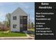 Modern two-story home boasts a sleek design, tidy front yard, and carriage house ready two-car garage at 315 E Minnesota St, Indianapolis, IN 46225