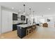 Modern kitchen with stainless appliances, white countertops, and an island with seating at 315 E Minnesota St, Indianapolis, IN 46225