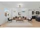 Bright living room featuring contemporary decor, hardwood floors, and ample natural light at 315 E Minnesota St, Indianapolis, IN 46225