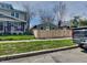 View of a home with a new privacy fence, situated on a well-maintained lot with green grass at 334 N Chester Ave, Indianapolis, IN 46201