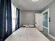 Cozy bedroom with a comfortable bed, ample natural light, and neutral walls, creating a relaxing atmosphere at 334 N Chester Ave, Indianapolis, IN 46201