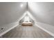 Charming bedroom featuring vaulted ceilings, gray walls, neutral carpet and a window for plenty of natural light at 341 Sanders St, Indianapolis, IN 46225